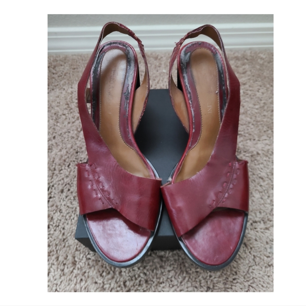 Maroon leather heels, open toe.